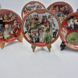 Five Danbury mint, collectible coca cola plates from December to April